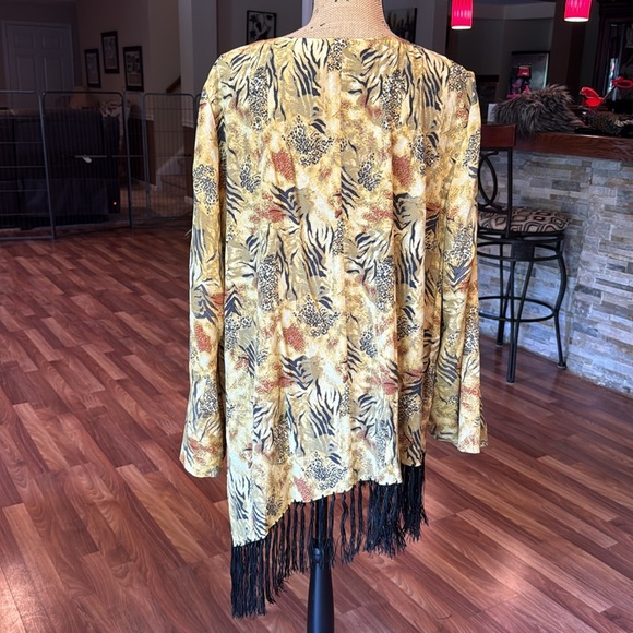 Size 1XL animal print sheer top with tassels along bottom - Picture 4 of 4